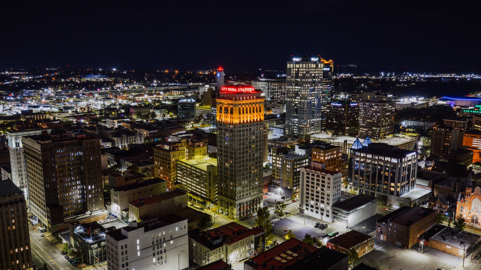 Downtown Birmingham, Alabama high-rises glowing after dark